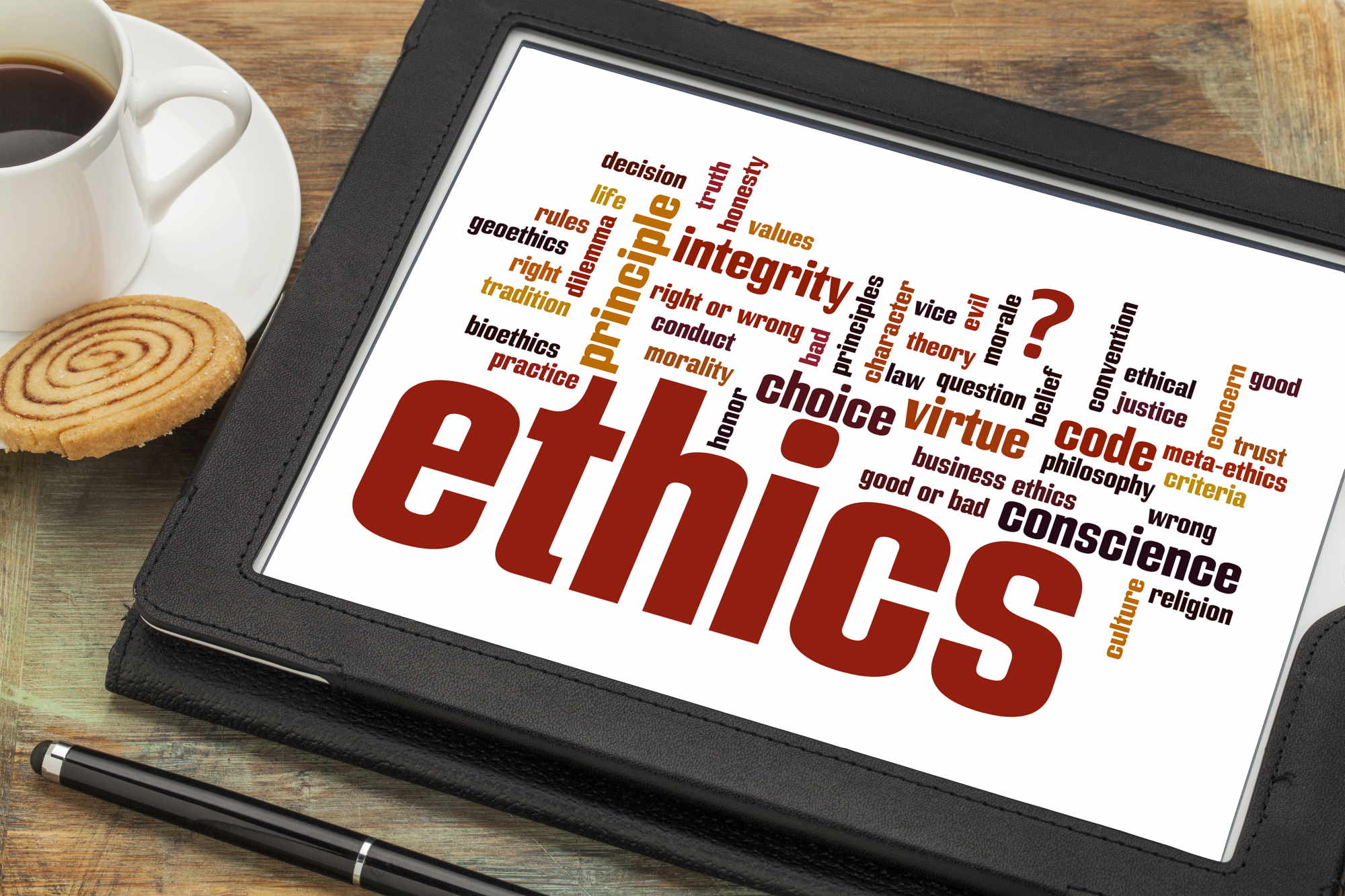 nube de palabras o etiquetas relacionadas con la ética y el dilema moral en una tableta digital